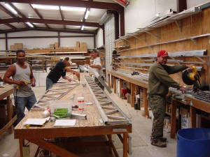 Vinyl Siding in Columbus GA | The Roberts Company, Inc. | Technicians Assembling Trusses